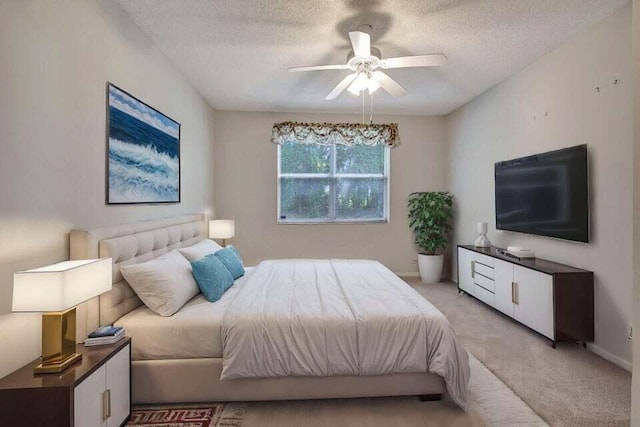 7886 Laina Ln Unit 2, Boynton Beach, FL 33437 - bedroom featuring light carpet, a textured ceiling, and a ceiling fan