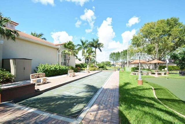 7886 Laina Ln Unit 2, Boynton Beach, FL 33437 - view of property's community with a game area and an area to practice putting