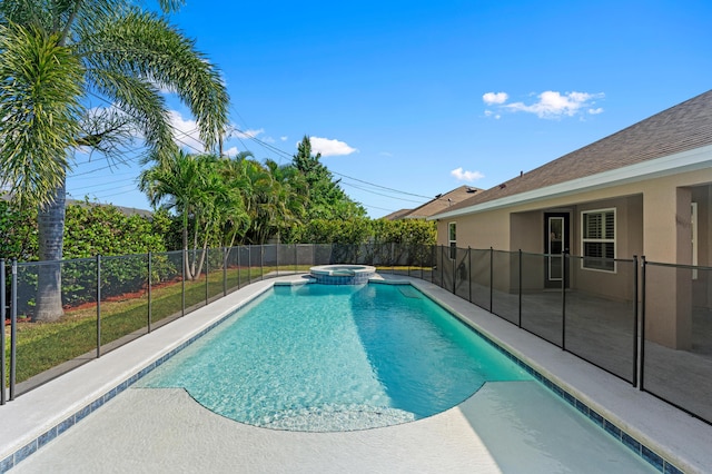 4672 SW Wade Dr, Port Saint Lucie, FL 34953 - view of swimming pool featuring a patio area and a pool with connected hot tub
