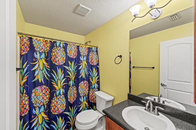 4672 SW Wade Dr, Port Saint Lucie, FL 34953 - full bath with vanity, toilet, a shower with curtain, and a textured ceiling