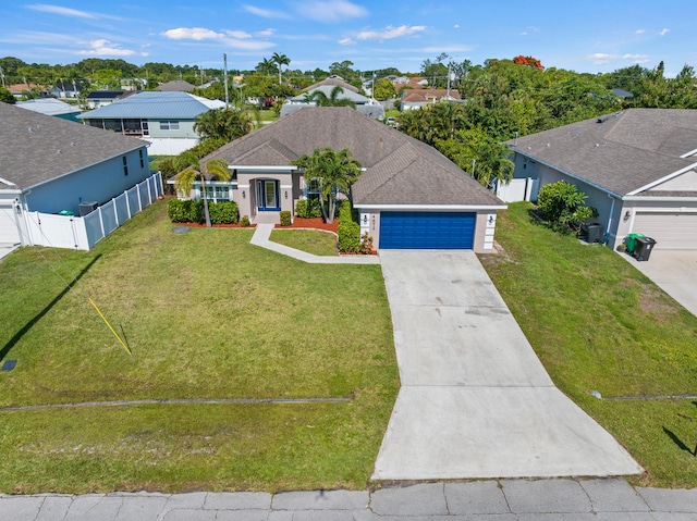 4672 SW Wade Dr, Port Saint Lucie, FL 34953 - ranch-style house with driveway, an attached garage, a residential view, and stucco siding