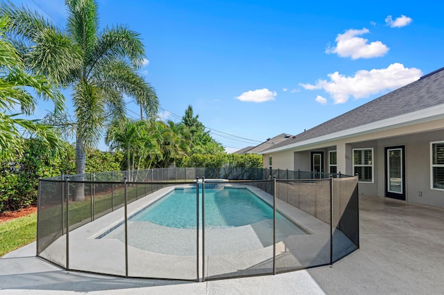 4672 SW Wade Dr, Port Saint Lucie, FL 34953 - view of pool featuring a fenced backyard, a patio, and a pool with connected hot tub