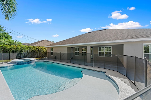 4672 SW Wade Dr, Port Saint Lucie, FL 34953 - view of swimming pool with a pool with connected hot tub and a patio area