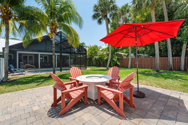 10 Copaire Rd, Sewalls Point, FL 34996 - view of patio with glass enclosure