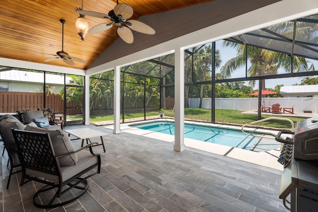 10 Copaire Rd, Sewalls Point, FL 34996 - view of pool featuring a fenced backyard, a patio area, outdoor lounge area, glass enclosure, and a ceiling fan
