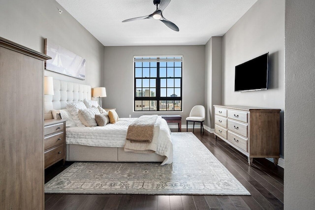 701 S Olive Ave Unit 923, West Palm Beach, FL 33401 - bedroom featuring dark wood-style flooring and baseboards