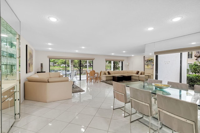 12 Westgate Ln Unit C, Boynton Beach, FL 33436 - dining room with recessed lighting and light tile patterned floors