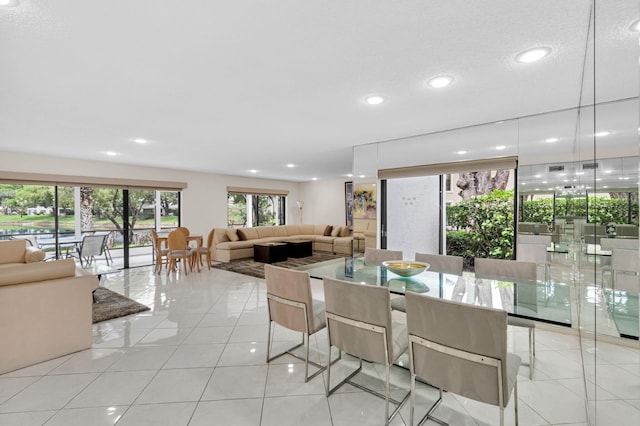 12 Westgate Ln Unit C, Boynton Beach, FL 33436 - dining area featuring recessed lighting and light tile patterned floors