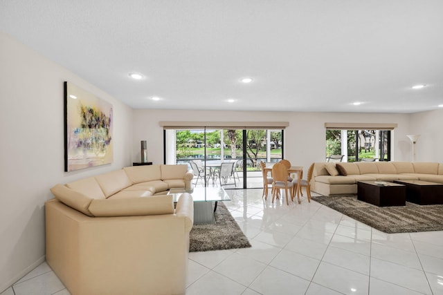 12 Westgate Ln Unit C, Boynton Beach, FL 33436 - living area with recessed lighting and light tile patterned floors