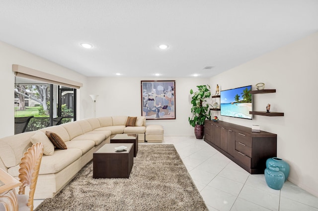 12 Westgate Ln Unit C, Boynton Beach, FL 33436 - living room featuring recessed lighting, baseboards, and light tile patterned flooring