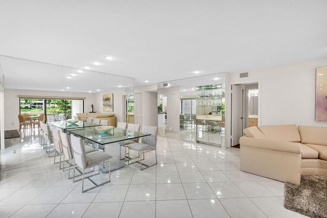 12 Westgate Ln Unit C, Boynton Beach, FL 33436 - dining room featuring light tile patterned floors and recessed lighting