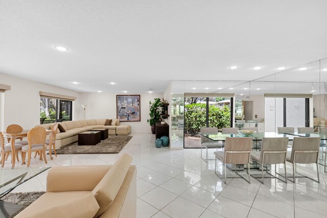 12 Westgate Ln Unit C, Boynton Beach, FL 33436 - living room with light tile patterned floors and recessed lighting