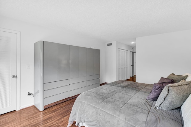 12 Westgate Ln Unit C, Boynton Beach, FL 33436 - bedroom featuring wood finished floors