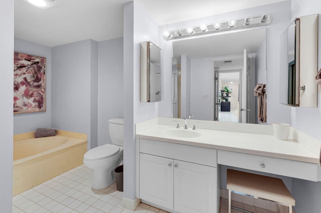 12 Westgate Ln Unit C, Boynton Beach, FL 33436 - full bathroom featuring a bath, toilet, vanity, and tile patterned flooring