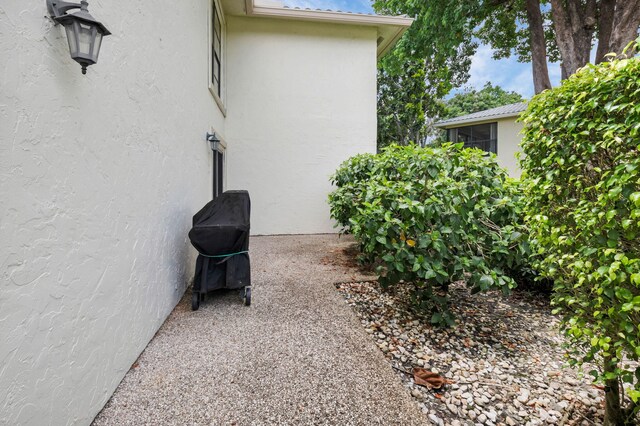 12 Westgate Ln Unit C, Boynton Beach, FL 33436 - view of patio featuring grilling area