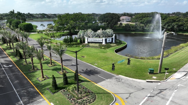 12 Westgate Ln Unit C, Boynton Beach, FL 33436 - surrounding community featuring a water view and a yard