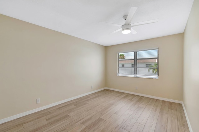 51 Stratford D, West Palm Beach, FL 33417 - spare room with light wood-style floors, baseboards, and ceiling fan