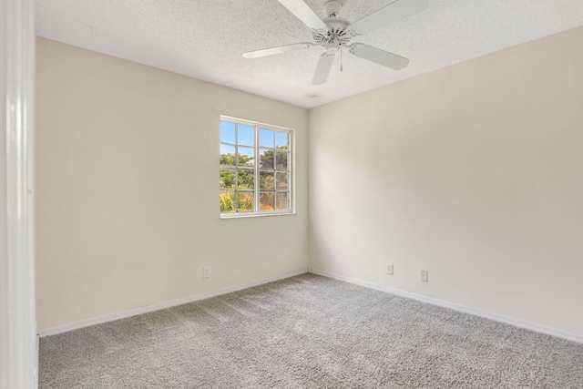 4667 SW 12th Ct, Deerfield Beach, FL 33442 - spare room with carpet flooring, a textured ceiling, baseboards, and a ceiling fan
