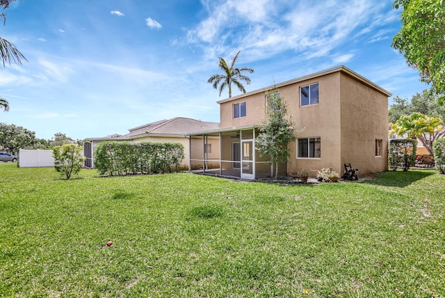 4667 SW 12th Ct, Deerfield Beach, FL 33442 - back of property featuring a sunroom, stucco siding, and a yard