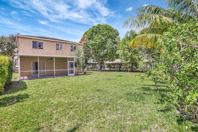 4667 SW 12th Ct, Deerfield Beach, FL 33442 - view of green lawn featuring a sunroom