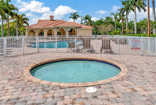 4667 SW 12th Ct, Deerfield Beach, FL 33442 - community pool with a patio area