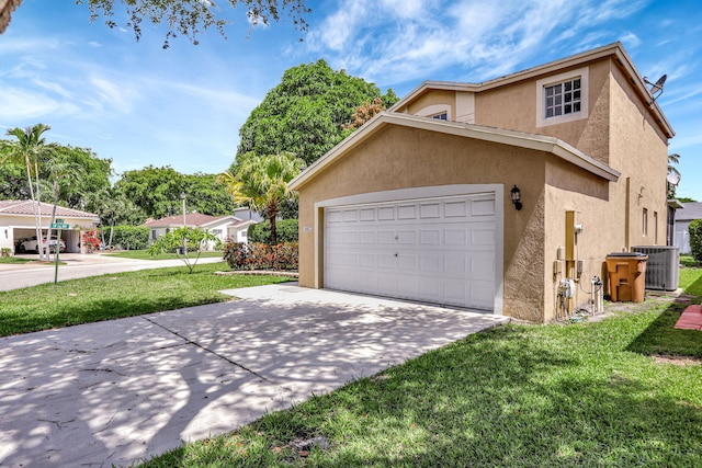 4667 SW 12th Ct, Deerfield Beach, FL 33442 - view of side of home with stucco siding, driveway, central air condition unit, a lawn, and a garage