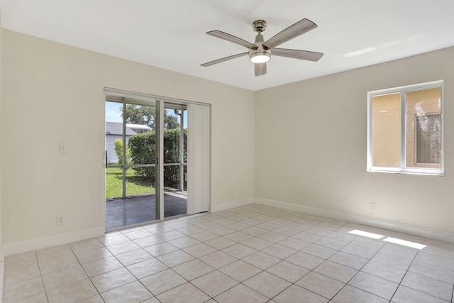4667 SW 12th Ct, Deerfield Beach, FL 33442 - spare room featuring light tile patterned floors, ceiling fan, and baseboards