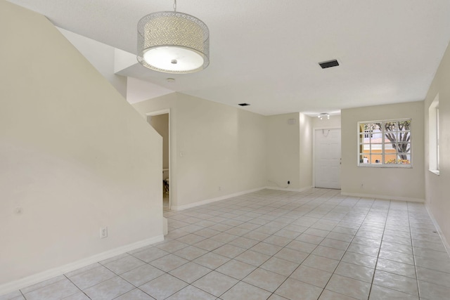 4667 SW 12th Ct, Deerfield Beach, FL 33442 - spare room with light tile patterned floors and baseboards