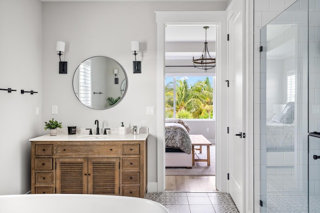 12277 Waterstone Cir, Palm Beach Gardens, FL 33412 - full bathroom with vanity, tile patterned flooring, a shower stall, and ensuite bathroom