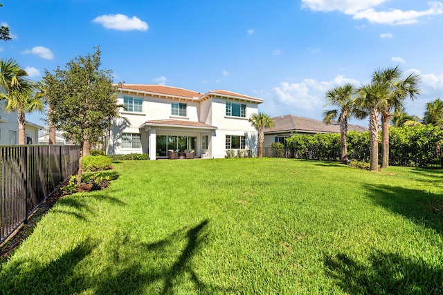 12277 Waterstone Cir, Palm Beach Gardens, FL 33412 - back of property with outdoor lounge area, stucco siding, and a patio area
