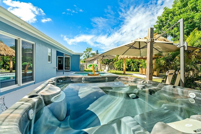 5031 Van Buren Rd, Delray Beach, FL 33484 - view of pool featuring a hot tub and a pool