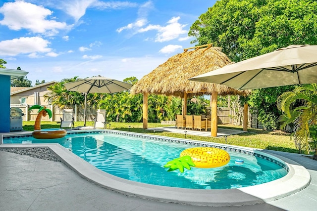 5031 Van Buren Rd, Delray Beach, FL 33484 - outdoor pool with a gazebo, a patio area, and a fenced backyard