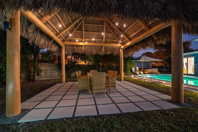 5031 Van Buren Rd, Delray Beach, FL 33484 - fenced backyard featuring a gazebo, a patio, and outdoor dining area