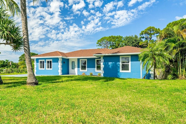 5031 Van Buren Rd, Delray Beach, FL 33484 - ranch-style home featuring a front lawn and stucco siding