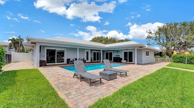 2739 NE 10th St, Pompano Beach, FL 33062 - back of property featuring a patio area, stucco siding, and ceiling fan