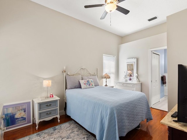470 NW Gibraltar Ct, Port Saint Lucie, FL 34986 - bedroom with wood finished floors and a ceiling fan