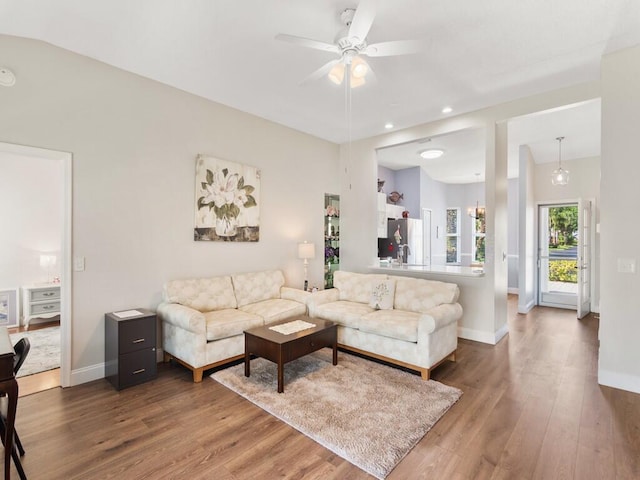 470 NW Gibraltar Ct, Port Saint Lucie, FL 34986 - living area with wood finished floors, baseboards, a ceiling fan, and recessed lighting