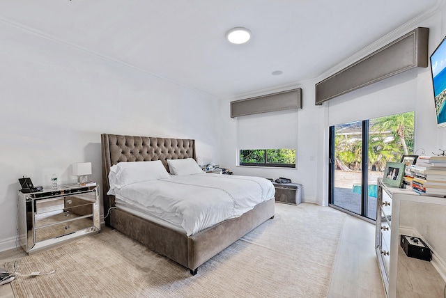 125 Pembroke Dr, Palm Beach Gardens, FL 33418 - bedroom featuring access to exterior, light wood finished floors, baseboards, and crown molding