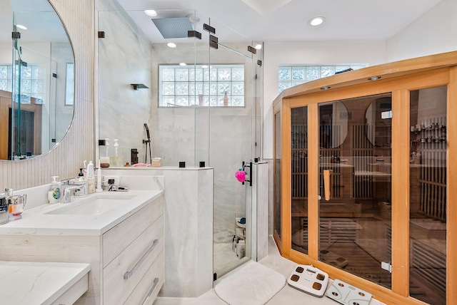 125 Pembroke Dr, Palm Beach Gardens, FL 33418 - full bathroom with a sauna / steam room, vanity, a shower stall, and recessed lighting