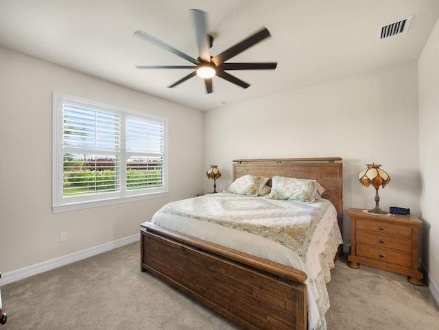 10621 SW Morning Glory Dr, Port Saint Lucie, FL 34987 - bedroom featuring light colored carpet, baseboards, and ceiling fan