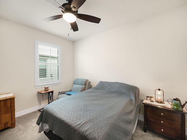 10621 SW Morning Glory Dr, Port Saint Lucie, FL 34987 - bedroom featuring light carpet, baseboards, and ceiling fan
