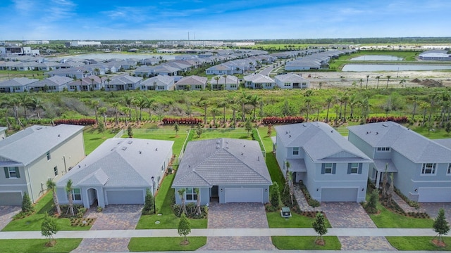 10621 SW Morning Glory Dr, Port Saint Lucie, FL 34987 - aerial view of residential area with a nearby body of water