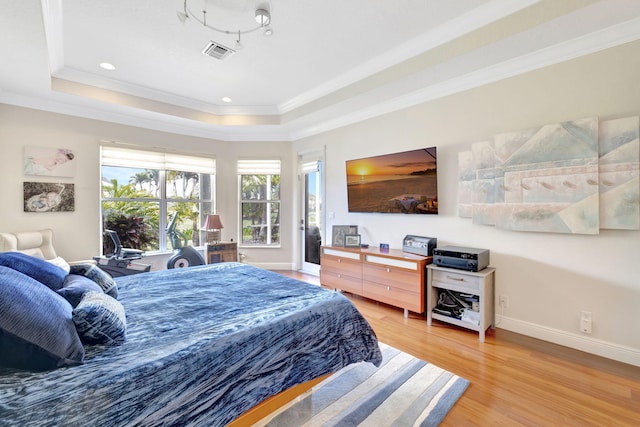 7181 Veneto Dr, Boynton Beach, FL 33437 - bedroom featuring a tray ceiling, ornamental molding, light wood finished floors, baseboards, and recessed lighting
