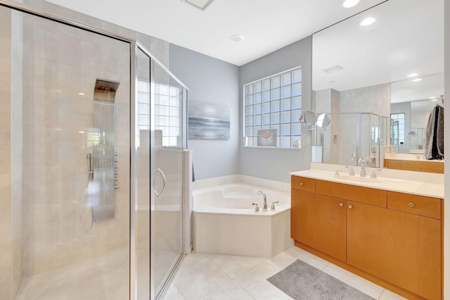 7181 Veneto Dr, Boynton Beach, FL 33437 - bathroom featuring vanity, a bath, a shower stall, healthy amount of natural light, and recessed lighting
