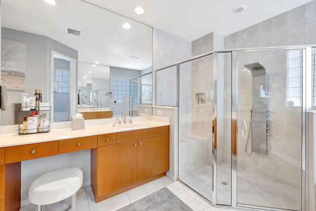 7181 Veneto Dr, Boynton Beach, FL 33437 - bathroom with vanity, a stall shower, tile patterned flooring, and recessed lighting
