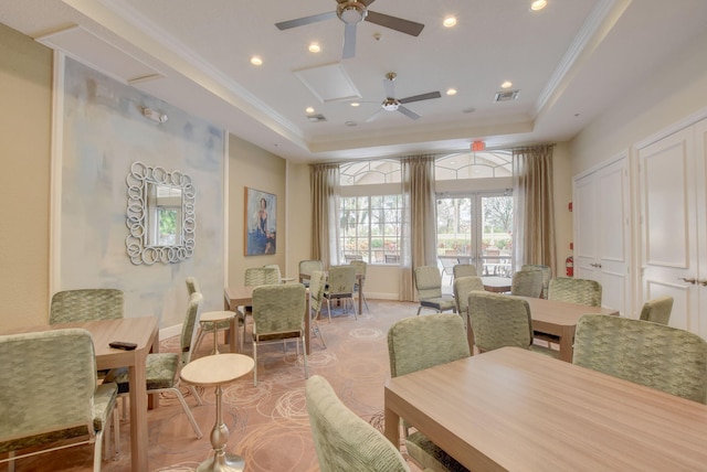 7181 Veneto Dr, Boynton Beach, FL 33437 - dining area with ceiling fan, a raised ceiling, recessed lighting, crown molding, and baseboards