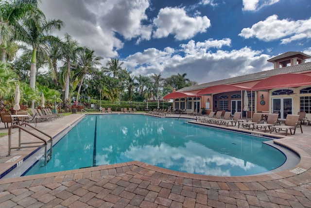 7181 Veneto Dr, Boynton Beach, FL 33437 - community pool featuring french doors and a patio