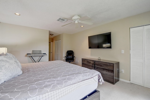 18 Westgate Ln Unit 18F, Boynton Beach, FL 33436 - carpeted bedroom featuring recessed lighting, a ceiling fan, multiple closets, a textured ceiling, and baseboards