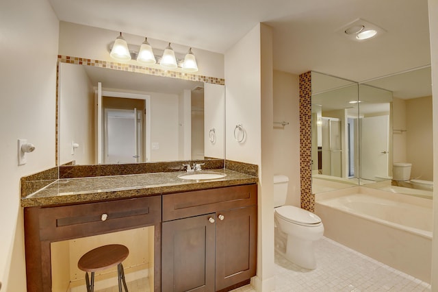 18 Westgate Ln Unit 18F, Boynton Beach, FL 33436 - full bathroom featuring a garden tub, toilet, vanity, an enclosed shower, and tile patterned flooring