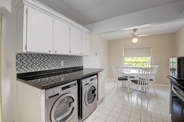 18 Westgate Ln Unit 18F, Boynton Beach, FL 33436 - washroom featuring washing machine and clothes dryer, baseboards, light tile patterned floors, and a ceiling fan